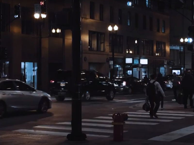 cars and people at night