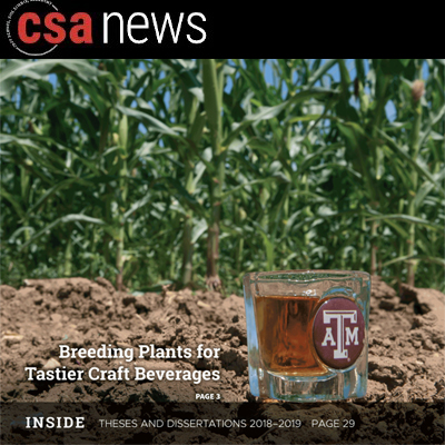 A cover for CSA News that features a picture of a glass with liquor in it sitting on the ground in front of crops that are used to make liquor